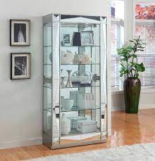 A short curio cabinet display case looks great in any room with a wall mirror above it. Mirrored Silver Faceted Curio Cabinet Rc Willey Salt Lake City Las Vegas Sacramento Re Interior Decorating Living Room Curio Cabinet Curio Cabinet Decor