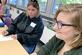 Oakwood High's Swap Day puts parents in children's seats