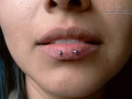 Horizontal Lip Piercing Pictures And Images For Horizontal Lip Piercing Facial Piercings Lip Piercing Face Piercings