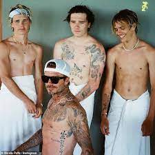 Brooklyn, 21, son of david and victoria beckham, has just had another tattoo done as a tribute to his fiancee nicola peltz. Romeo Beckham Debuts New Arm Cherub Tattoo In Shirtless Snap With Brothers Daily Mail Online