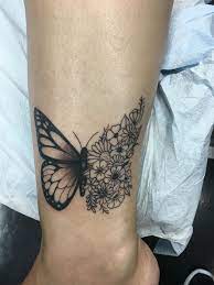 Love My New Butterfly Flower Tattoo Looks Perfect On My Ankle Myfavoritetattoos Cute Ankle Tattoos Butterfly Ankle Tattoos Ankle Tattoo Cover Up