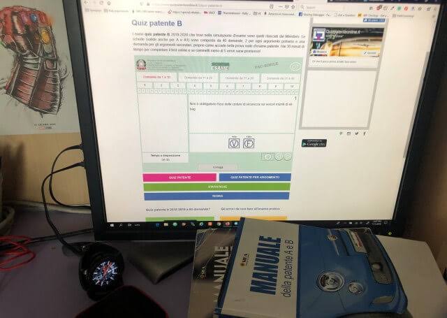 Candidate taking a computerized theory test inside an official Motorizzazione Civile examination room, Best Guide to win Italian Driving License - LetsTravelliamo. how to get a driving license in Italy