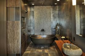 Interior of a modern designed bathroom that has floor to ceiling tiles in a soft grey that contrast. 21 Peaceful Zen Bathroom Design Ideas For Relaxation In Your Home