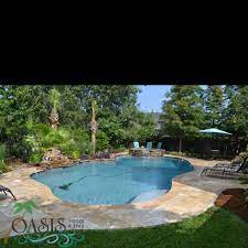Beautiful Lagoon Shaped Pool In Mandeville La By Oasis Pools And Spas Llc Oasis Pool Swimming Pools Spa Pool