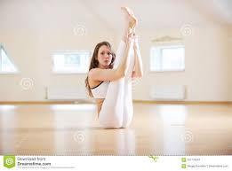 Beautiful Woman Practices Yoga Asana Eka Pada Padma Urdhva Mukha Paschimottanasana In The Yoga Studio Stock Image Image Of Indoor Girl 101778347