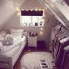 Hanging a tapestry, quilt, or rug above your bed is a great way to add a little bit of style and a little bit of cozy texture to any bedroom. 3