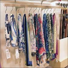 Sak S Scarves Square S Hooked By Size Fixtures Close Up Scarf Display Hijab Store Display Sort By Size