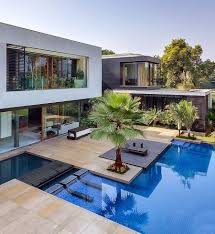 Lavish Contemporary Home In New Delhi Puts Nature Center Stage Architecture Architecture House Modern Pools