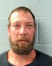 Two arrested after assault Woman also arrested for burglary