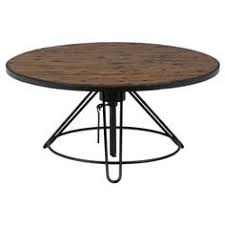Update Your Home With This Stylish Distressed Wood Cocktail Table The Round Table Is V Round Industrial Coffee Table Wood Cocktail Table Round Cocktail Tables