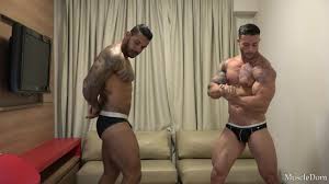 gorgeous young muscle hunks show off together [Video]