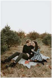 When it comes to cuddling and hot cocoa we believe you can never have enough! A Smolak Farms Tree Farm Engagement Session In North Andover Massachusetts Scarlet Roots Photography