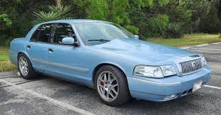 Image result for Light Ice Blue 2010 Crown Victoria