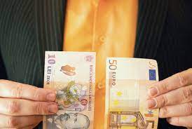 53 ron romanian leu to eur euro. Businessman In Suit Holding Romanian Lei Banknote Money In One Hand And 50 Fifty Euros In Other Hand Closeup Shot Depict Romania Schengen Zone Approval Buy This Stock Photo And Explore