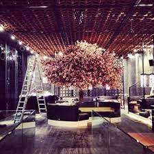 tattu manchester with real dried cherry blossom tree bar design store design japanese hotel