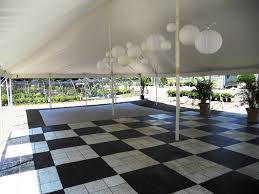 Black And White Dance Floor Rental A Wedding Is A Party Without Some Dancing Here S Our 30 X 45 Pole Tent With Our Black And White Dance Floor Decorated With S Wedding Lanterns Party Tent Tent
