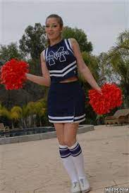 Now fully naked, she spreads her legs and jerks off her cock. Dani Daniels Hot Cheerleader Toys Her Pussy Mofos 16 Pictures