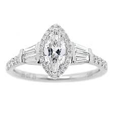 My engagement ring band is on the uniquer side with different sized round diamonds in a marquise like band. Mallory 1ctw Marquise Diamond Halo Engagement Ring In 14k White Gold