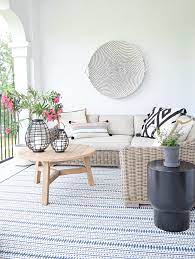 You can easily give your patio or deck a quick makeover with just a rug to beautify it. Favorite Outdoor Rugs Pillows This Season Zdesign At Home