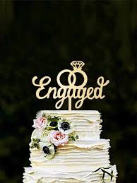 The first and foremost step is to you can draw inspiration from this cake design that has a cupid's arrow striking the two engagement rings which makes it a perfect announcement. Mirror Gold Engaged Cake Topper For Engagement Party Decoration Cake Decorating Wedding Cake Topper Cake Decorating Supplies Aliexpress