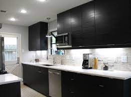 Black kitchen cabinets with white quartz countertops. White Quartz Countertops With Black Cabinets Stoneadd Photo
