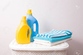 If you know how to wash clothes to prevent fading, it will help all of your clothes last longer. A Stack Of Colored Laundry And Washing Gels In Yellow And Blue Stock Photo Picture And Royalty Free Image Image 153333605