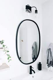 Our Master Bathroom Fixer Upper Simply Well Spent Black Modern Oval Mirror From Umbra Matte Black F Oval Mirror Bathroom Fixer Upper Bathroom Oval Mirror