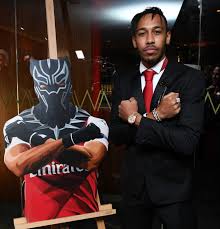 After the second goal, aubameyang went over to the wall behind the net and fished out a black panther mask, which had clearly been waiting for him throughout the second half, if not all night Aubameyang Does Iconic Black Panther Pose And Arsenal Stars Play Table Football As Club Put Recent Form Behind Them To Raise Cash At Charity Bash