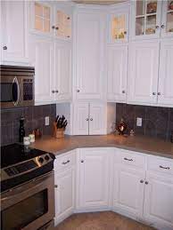 By selecting a spacious upper cabinet and working a tambor door into its design, you'll be all set for stashing everything, including countertop appliances. Cabinet Corner Joplin Mo Upper Kitchen Cabinets Kitchen Cabinets Upper Corner Best Kitchen Cabinets
