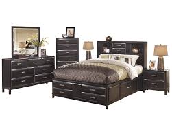 For an extra touch of comfort, you can purchase a discount queen bedroom set with a padded or tufted headboard or choose one that offers additional storage space for your clothes, books and linens. Ashley Furniture Kira 6 Pc Bedroom Set Queen Storage Bed Dresser Mirror 2 Nightstand Chest Black Walmart Com Walmart Com