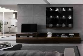 It serves as a background for the wall mounted television and is sleek and slim, occupying very little space. Wall Tv Cabinet Design