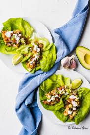 The flaky white fish in these corn tortillas is soaked in the flavors of smoked paprika and cumin. Baja Fish Tacos Recipe With Mexican Lime Crema