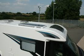 Camper van with solar panels. Gear Guide Caravan And Motorhome Solar Panels Caravan Guard
