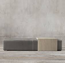 Stocked in light gray & dark gray fabric. Bridge Leather Coffee Table Ottoman