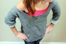 If you want to make things easier on yourself, cut through. How To Cut A Sweatshirt For An 80s Style