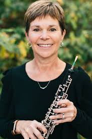 Diana Perdue and her husband own an auto parts store and a 700 acre farm in  Junction City, Oregon, growing sweet corn and squash, grass seed, and sugar  beets! An oboist and