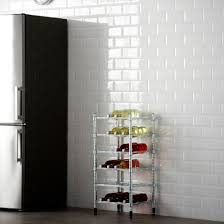 Un Range Bouteille Epure Esprit Industriel En Fer Avec Des Pieds Sur Roulettes Pour Ranger Ses Bouteilles Dans L Range Bouteille Range Bouteille Ikea Rayonnage