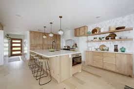 Open Kitchen With Flat Front Natural Alder Wood Cabinets Light Wood Floors Globe Pendants Wi Light Wood Kitchens Alder Kitchen Cabinets Wood Kitchen Cabinets