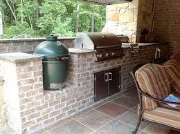 This outdoor kitchen idea matches with your needs, if you want an outdoor kitchen with a shelter which will the brick floor also fits with stonework under the countertop. Outdoor Kitchens Photo Gallery Outdoor Kitchen Design Outdoor Kitchen Outdoor Kitchen Bars