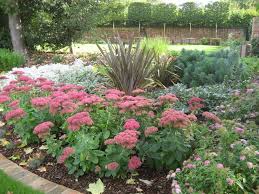 Mixed Border With Sedum Spectabile And Phormium University Of Georgia Garden Design Gallery Garden Design Pond Landscaping Sedum