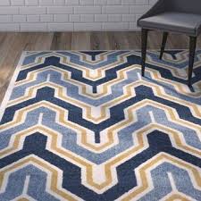A solid colour is a simple option if you can't choose, but patterns also have their own unique properties. Pacheco Geometric Tufted Blue Beige Area Rug Area Rugs Beige Area Rugs Beige Rug
