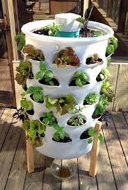 Garden Tower Project Set Up Planting Guide Photos Vertical Vegetable Gardens Vertical Vegetable Garden Veggie Garden