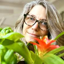 Ms. Carole is cultivating calm and peace this summer by digging in her  garden and relaxing at home. The Keys summer sun is helping our plants AND  us grow!🌼🏡🌟 Our entire team