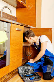 Hinge repair brackets, cabinet hinge repair plate, kitchen cupboard door hinge repair plate kit includes fixing screws, brushed stainless steel brace brackets with hole(1pcs). Young Man Repair Something Inside Kitchen Cabinet Under The Sink Stock Photo Picture And Royalty Free Image Image 73485324