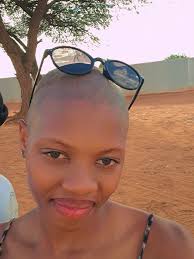 I am a bald Nigeria based model woman. Yes, we exist, but I do not blame  you for not knowing that. We are unseen and rendered invisible.We have  confidence and boldness. @gray_africana #