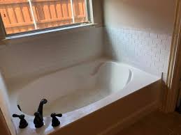 Options for decorative backsplash panels range from metal — like tin backsplashes — to glass tile and more, along with stunning patterns and colors to choose from. New Tile Backsplash Around The Bath Tub Kpm Construction Facebook