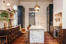 She explains, i found this desk at an antiques show, topped it with salvaged jasper stone, and put a wolf range on top. A Modern Kitchen With A Vintage Vibe