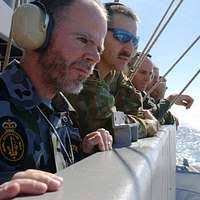 Cmdr. Scott Maloney, right, executive officer aboard USS Michael Murphy  (DDG 112), and Fire Controlman 2nd Class Matthew Verduyn conduct a  maintenance condition inspection