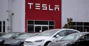 Tesla critics smash electric car with sledgehammers and bats as Elon Musk  protests sweep the nation