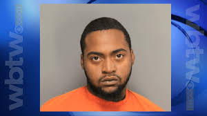 Florence man is charged with armed robbery and possession of a gun